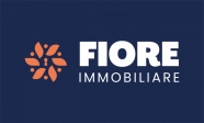 Logo dell'agenzia immobiliare